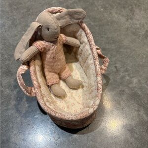 Maileg micro rabbit in cot . Pink.